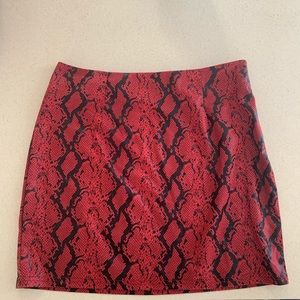 Red snake skin print skirt